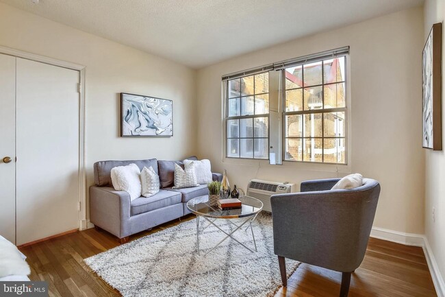 Shows staged version of furnished apartment - 3051 Idaho Ave NW