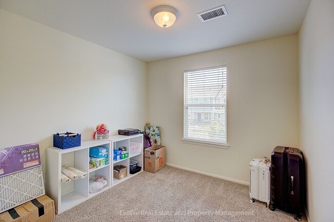 Building Photo - Evolve Real Estate: Beautiful Corner Townhome Available for Move-in on July 21st!