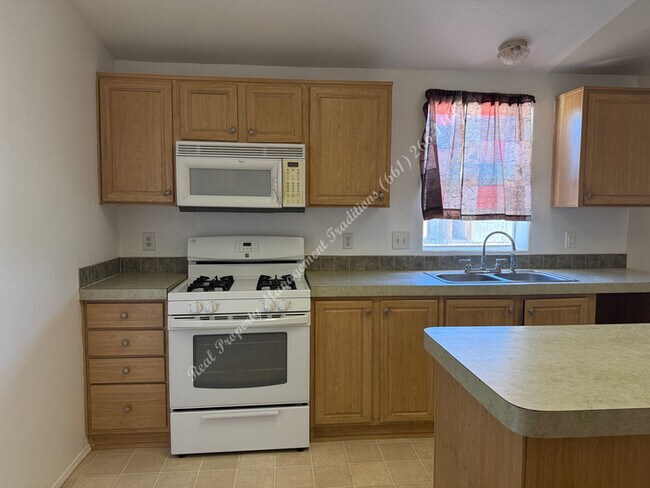 Building Photo - New Year Special! 50% Off First Month's Rent!