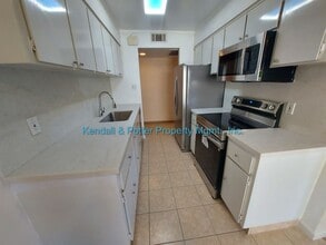 Building Photo - NEWLY RENOVATED Capitola 2BR with Brand-New Kitchen, Flooring & Paint – Oversized Patio, Pool Acc...