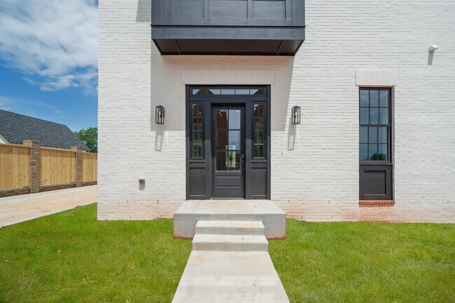 Building Photo - Classic Cape Cod Meets Modern Glam: Your D...