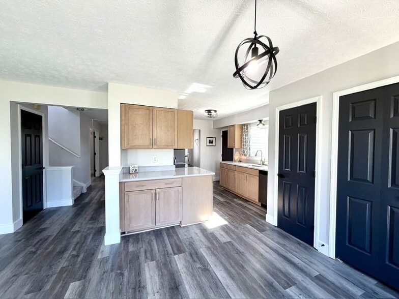 Kitchen opens to dining area and living area - 1200 Bugle Bluff Ct