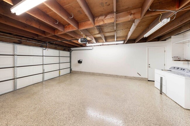 Building Photo - Fully renovated 2 bedroom 2 car garage Townhome