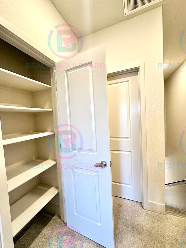 Building Photo - Modern Designer 2 Bedroom 2.5 Bathroom Tow...