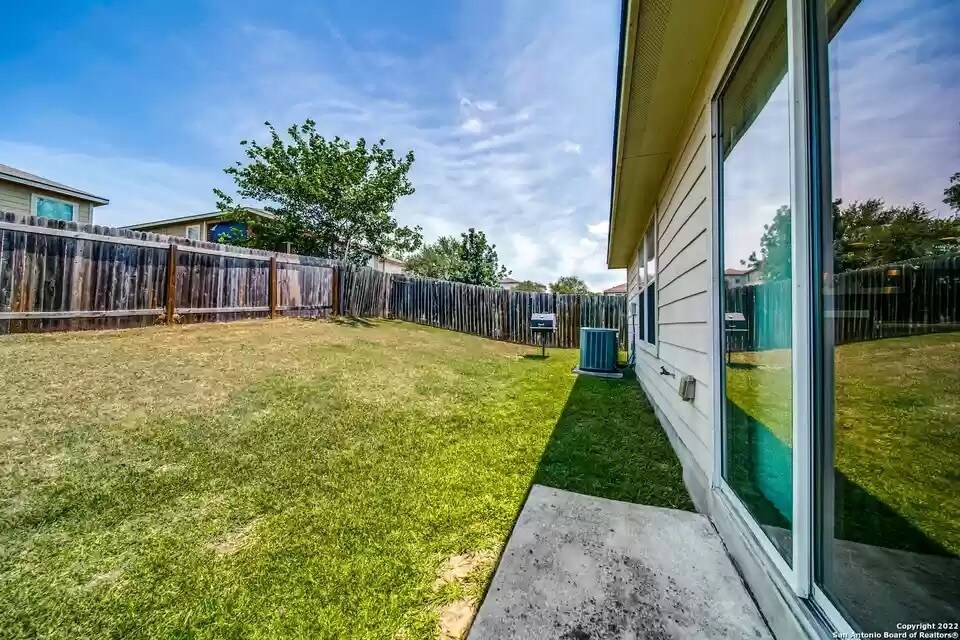 Building Photo - 6327 Wild Flower Way