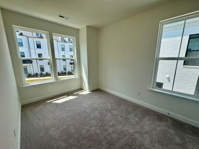 Building Photo - Beautiful New Construction, Three Story To...