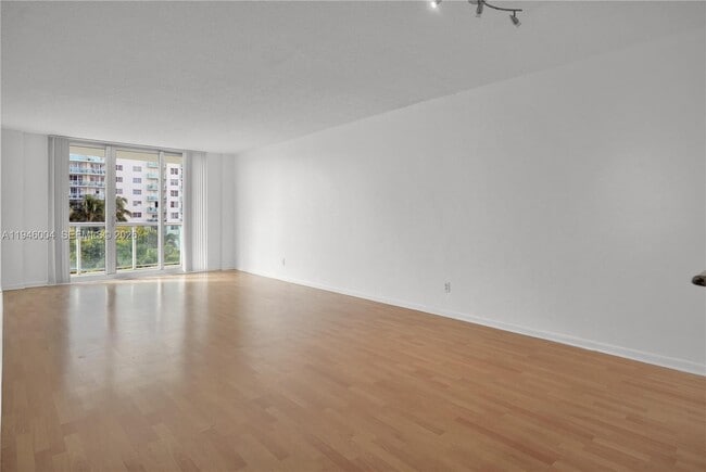 Building Photo - 19380 Collins Ave