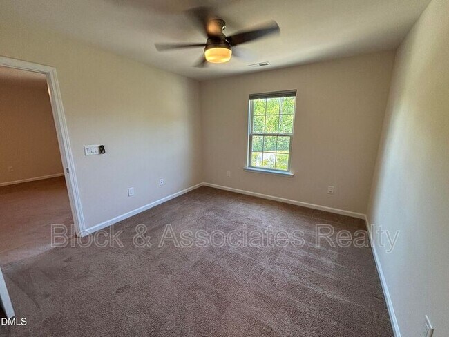 Building Photo - 1009 Magnolia Blossom Ln