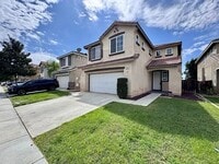 Building Photo - Spacious and Bright Open-Concept Living