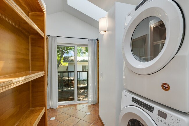 Newer washer and Gas Dryer Custom wood shelving - 228 N Pueblo Ave