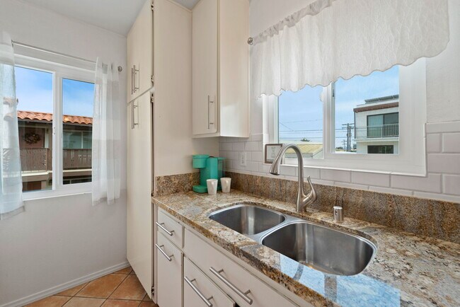 New windows in kitchen - 709 Agate St