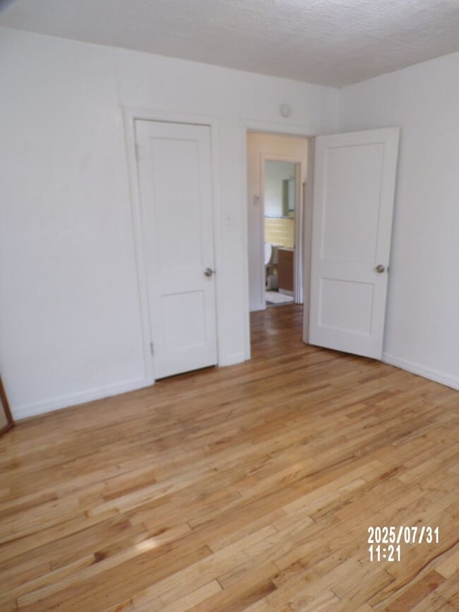 Building Photo - NEW listing-refinished hardwood floors, new laminate and paint throughout