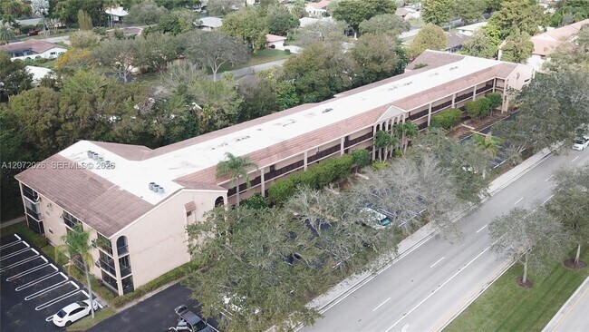 Building Photo - 2700 Coral Springs Dr