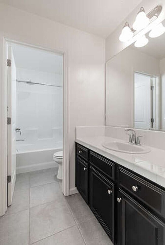 Building Photo - Charming Riverstone Home with Spacious Kitchen Island & Private Backyard