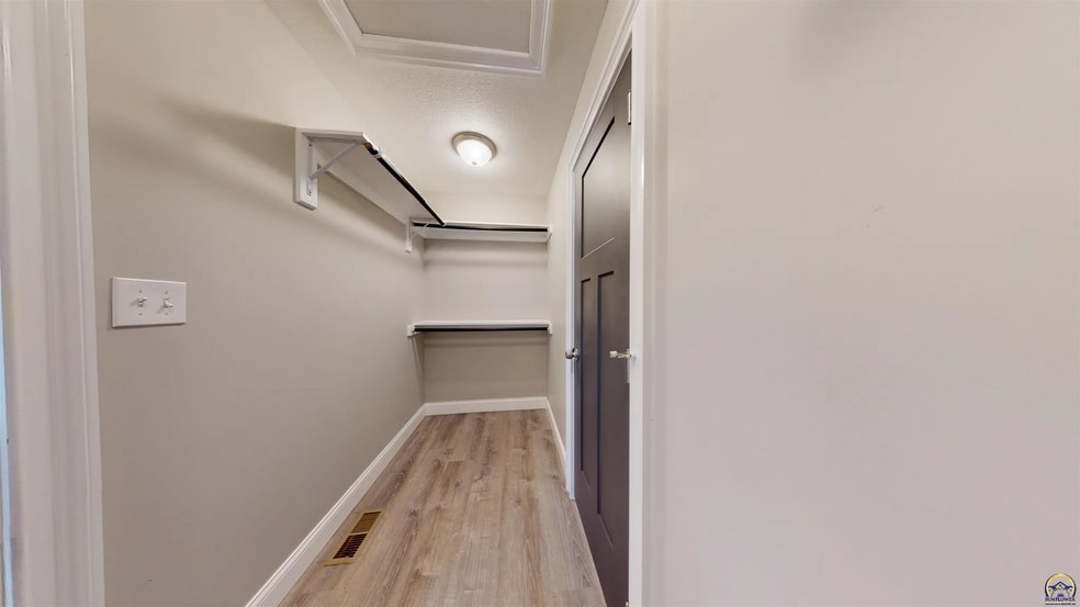 Primary Bedroom walk in closet - 3755 SW Summerfield Dr
