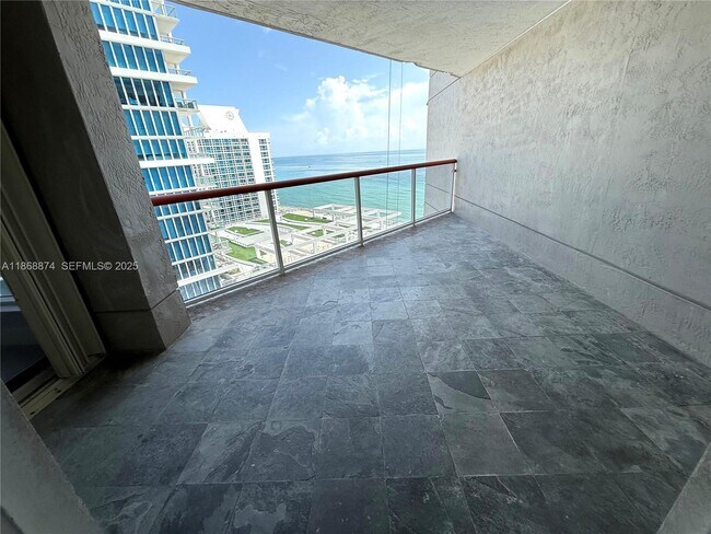 Building Photo - 6767 Collins Ave