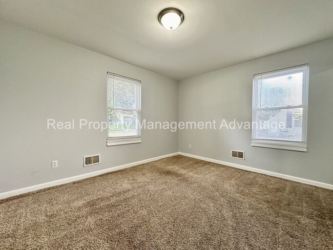 Building Photo - Mid-Century Ranch Boasts 3 Large Bedrooms ...