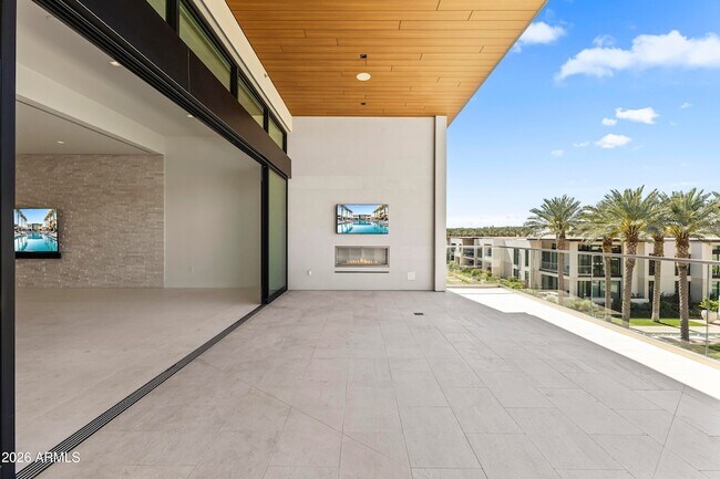 Building Photo - 6587 N Palmeraie Blvd