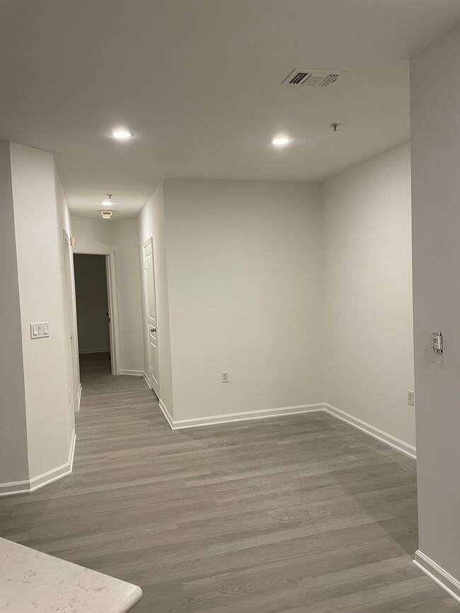 Dining Room and Hallway to Master and Guest Bedrooms - 12913 Alton Sq