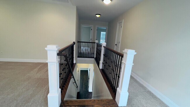 Building Photo - 4 bedroom 2.5 bathroom townhome located in Beaumont Park Townhome