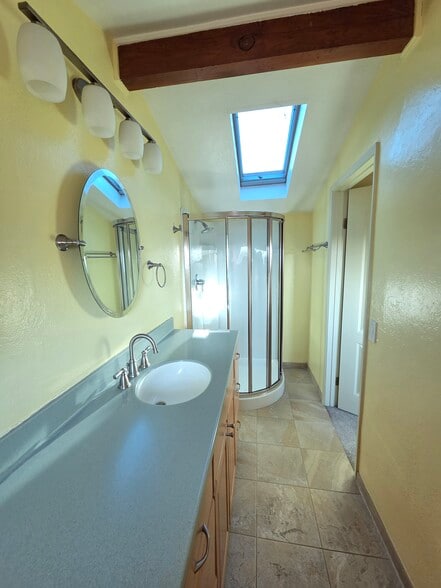 Electric skylight above shower. - 2753 Sulphur Dr