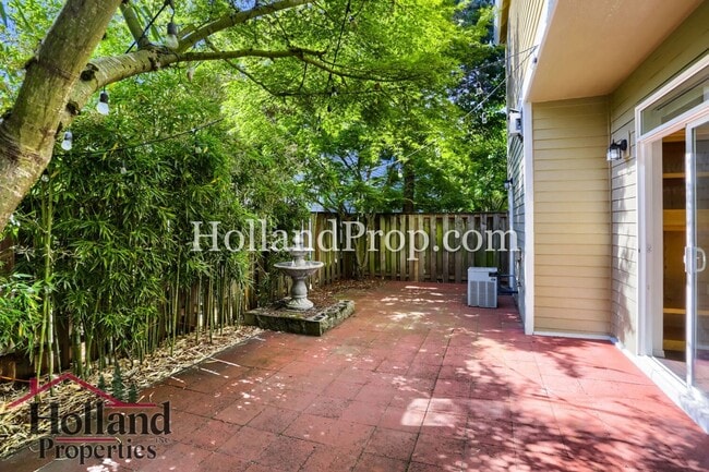 Building Photo - Charming 3-Bedroom Home with Wood Floors, Gas Fireplace & Private Patio