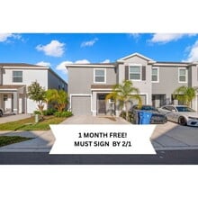 Building Photo - "Spacious 3-Bedroom Townhouse Oasis with 2.5 Baths in Serene Apollo Beach!"