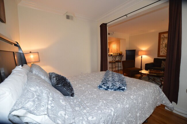 Building Photo - Charming Furnished Studio with Large Patio...