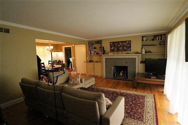 Living room with gas fireplace - 61 Cornell Blvd