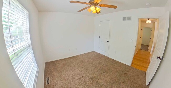 Building Photo - HUGE Backyard + Amazing Patio + Pet Friend...