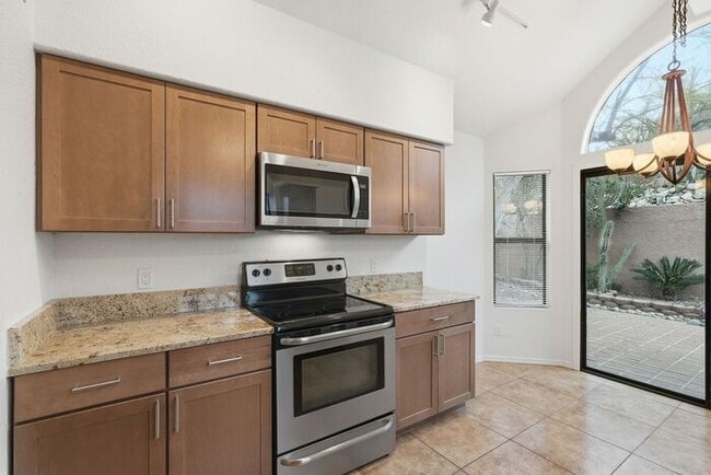 Building Photo - Bright & Peaceful Living in Oro Valley’s Gated Stoney Canyon