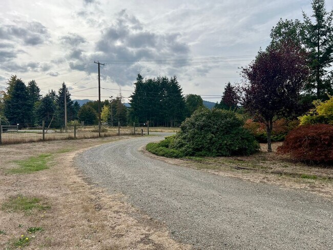 Building Photo - Spacious Home with Outbuildings on 2.3 Acres