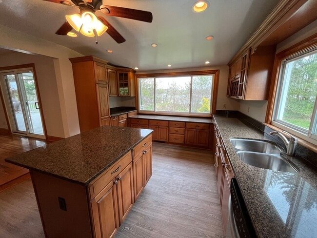 Building Photo - **RIVERFRONT 4-BEDROOM/2-BATH WITH 4-CAR GARAGE, FULL BASEMENT!!**