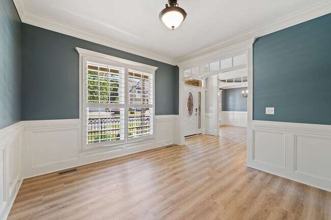 Building Photo - Apex Rental with Renovated Attic, Screened...