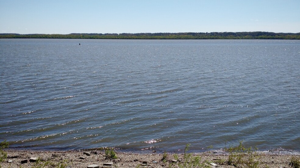 Across the Street - 14711 N River Beach Dr