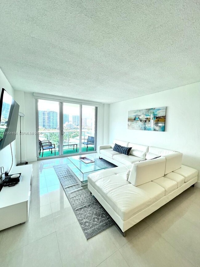 Building Photo - 19370 Collins Ave