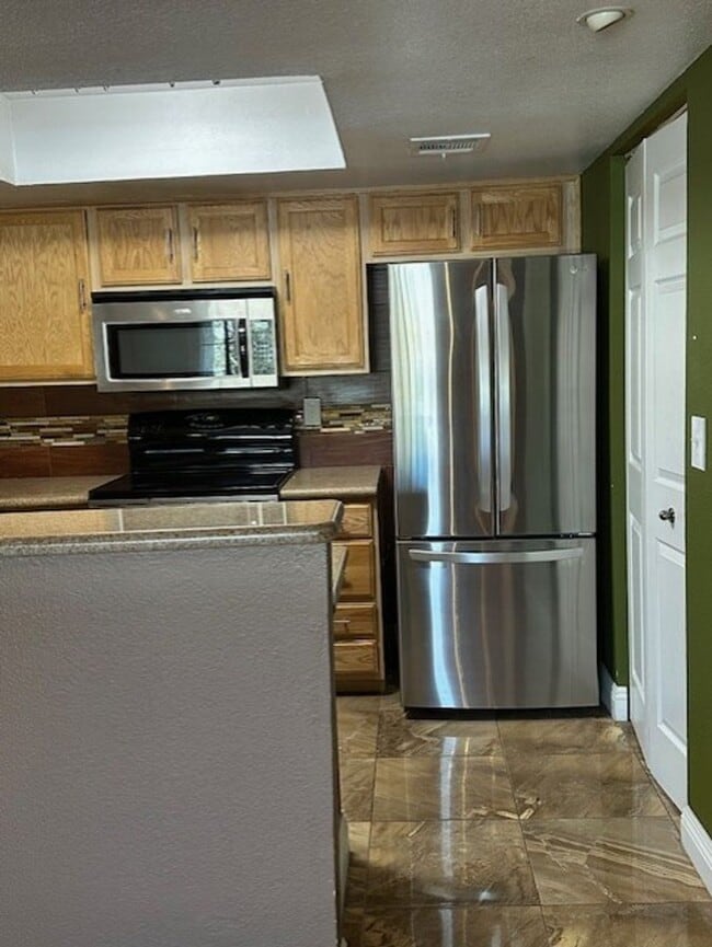 Building Photo - Spacious 2-Bedroom, 2-Bath Condo with Fire...