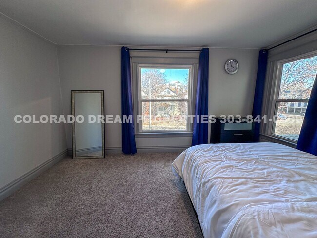 Building Photo - A home where old-world charm meets modern sophistication!