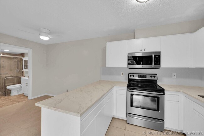 Building Photo - 5857 SE Windsong Ln