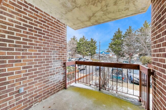 Building Photo - Spacious Updated Condo Available for Immediate Move-In