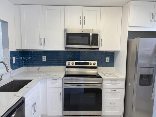 Building Photo - 9539 Boca Cove Cir