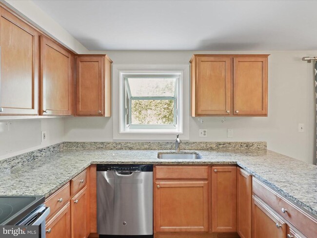 Building Photo - 6502 Coachleigh Way