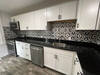 Building Photo - Updated 3 Bedroom House With a backyard and Laundry