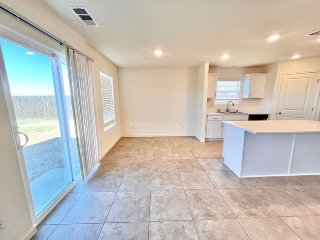 Building Photo - Spacious 4 Bedroom Home  – Solar & Pest Co...