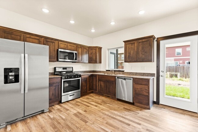 Building Photo - 2-Story Urban Triplex at a modern community featuring 3 Bedrooms 3 Bathrooms