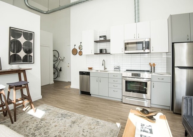 Building Photo - App Fee Special: Sleek & Modern Studio w/Condo-Grade Finishes + Patio!