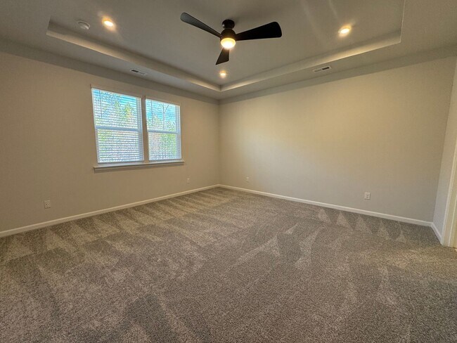 Building Photo - Spacious 1.5-Story 4BR Home with Bonus Room in Active 55+ Community