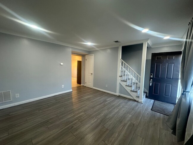 Building Photo - Centrally Located 2 BR Green Townhome with Fenced Patio