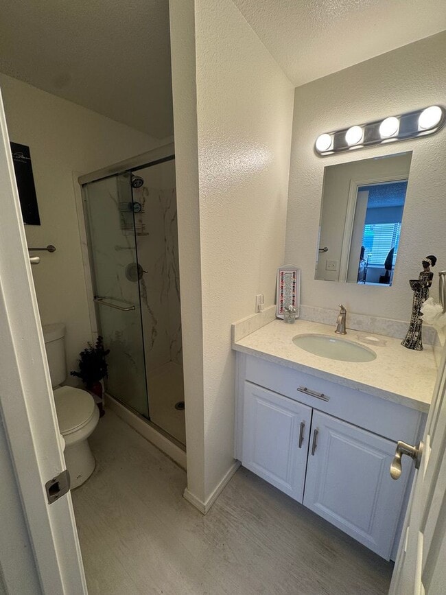 Building Photo - Gorgeous Condo in Seward Park with 2 Parking Spaces, Steps Away from Pool with Water View!