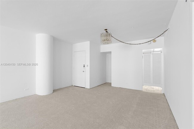 Building Photo - 5005 Collins Ave